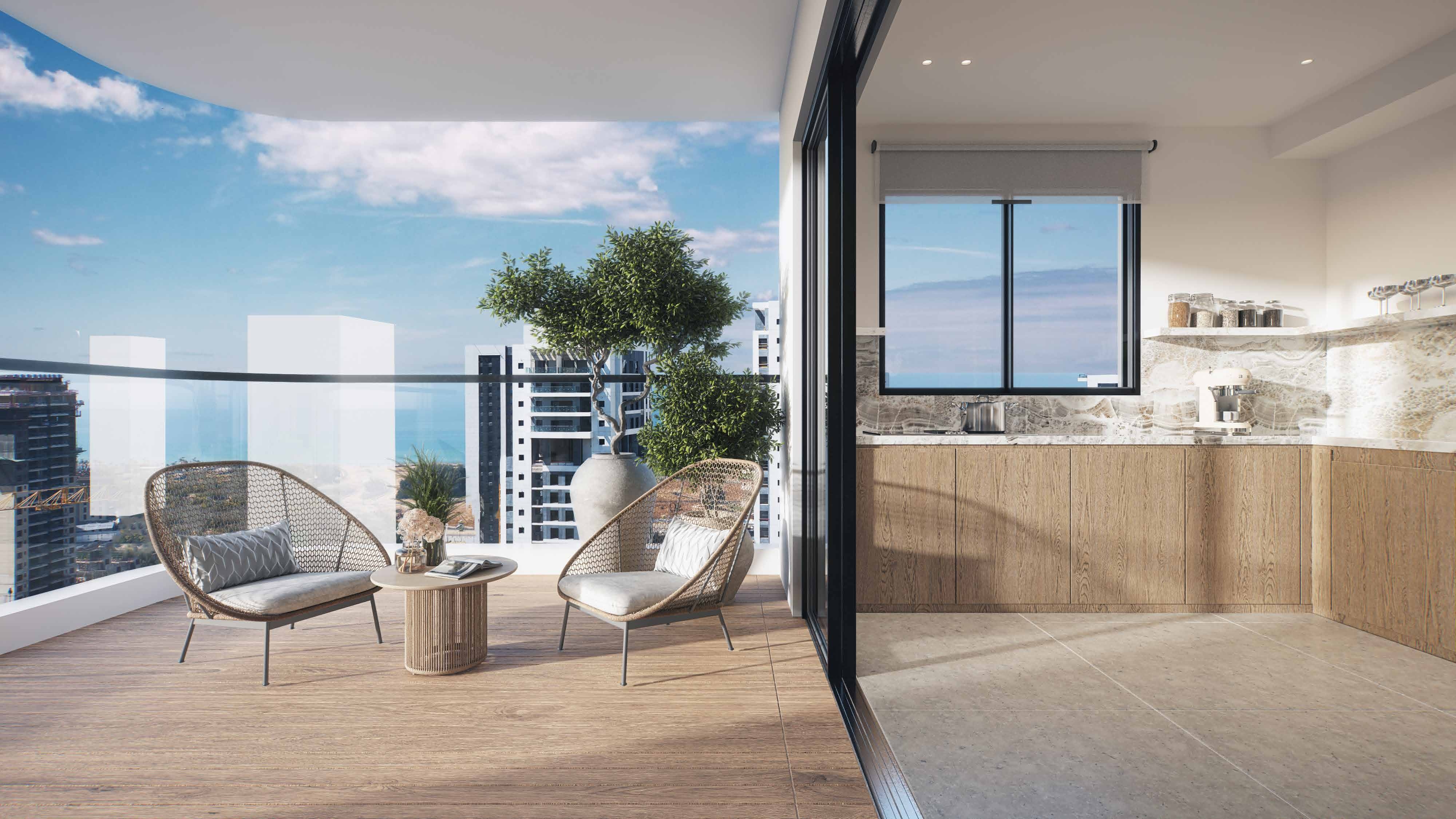 Modern designer kitchen at The Island Bat Yam residences with premium stone finishes and large windows