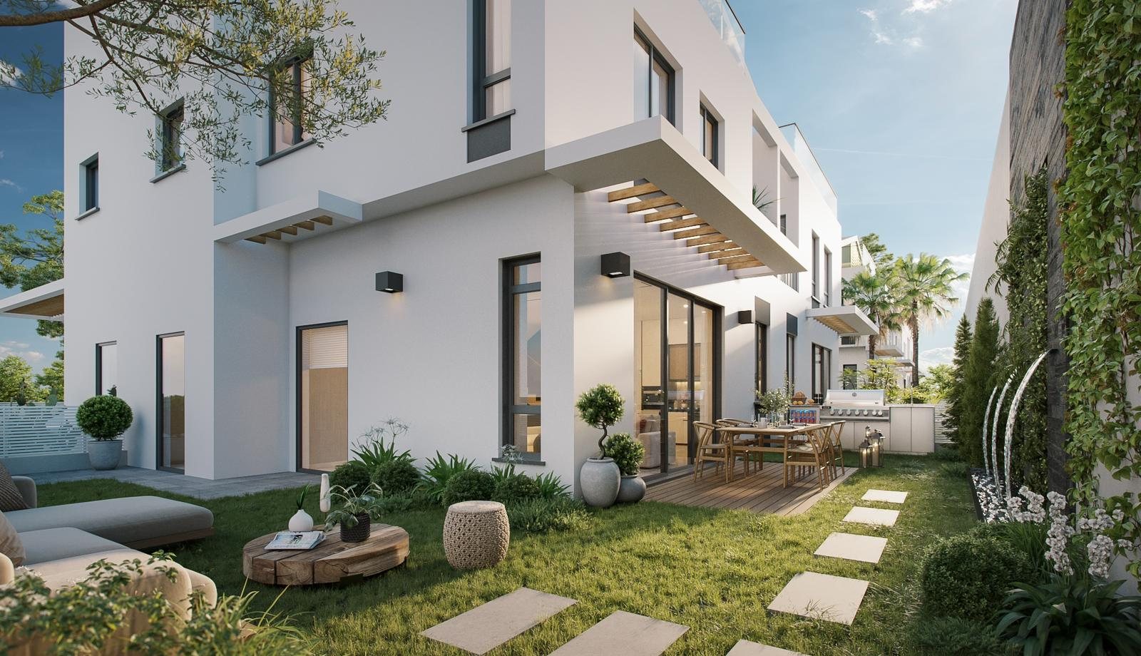 Side garden with stepping stones and planted wall beside a Mevo Modi'im townhouse