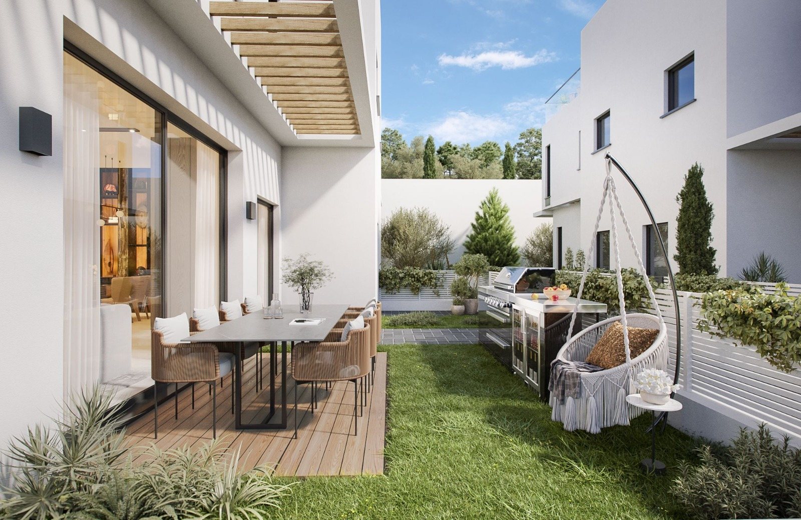 Private garden with pergola, outdoor dining table and lawn at a Mevo Modi'im home