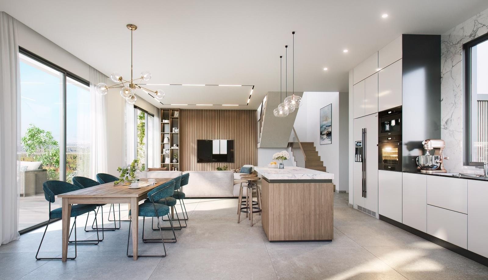 Kitchen and dining area with island and internal staircase in a Mevo Modi'im townhouse
