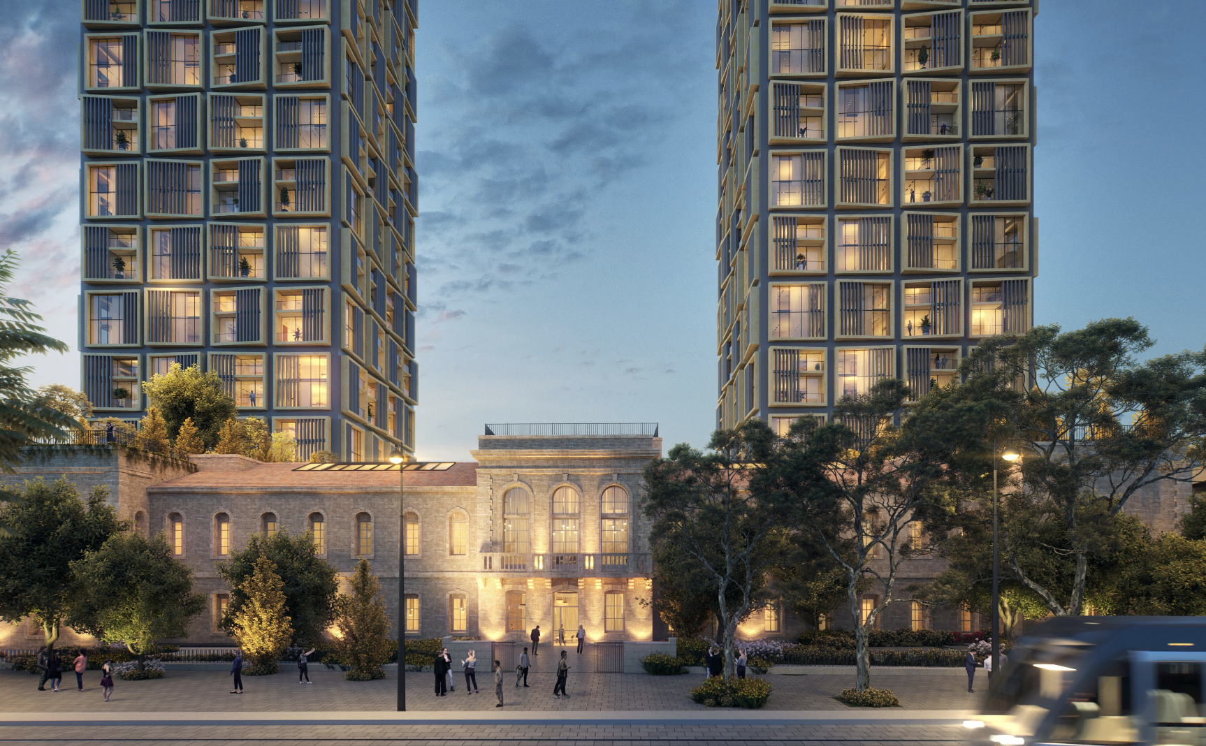 Bustling stone-arched ground-level piazza connecting the residential towers and commercial boutique spaces in Midtown Jerusalem